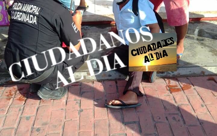 Varios lesionados luego de resbalar en arco sanitizante en el mercado de Motul