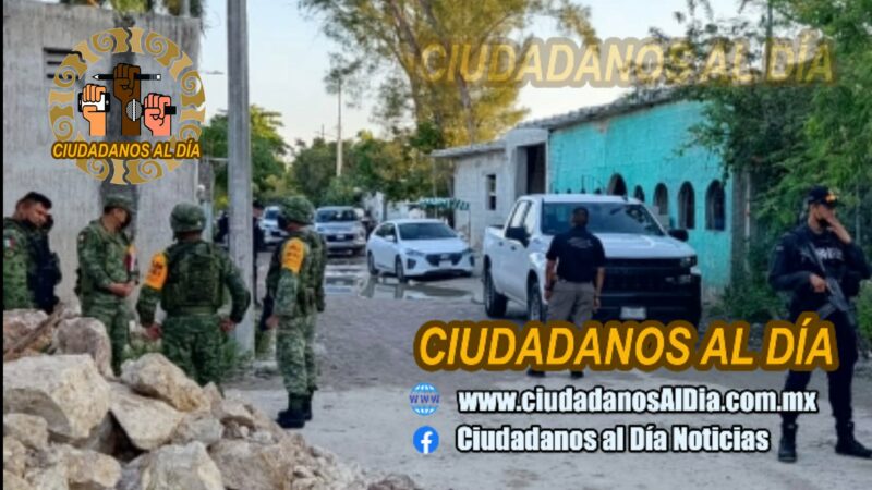 Policía ministerial de la FGR realiza cateo en una casa en el puerto de Celestún.