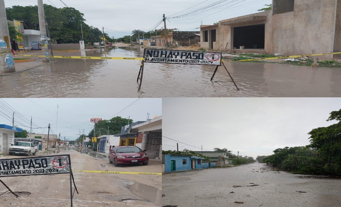 Las lluvias trasforman enormes baches en lagunas en calles de Telchac Puerto