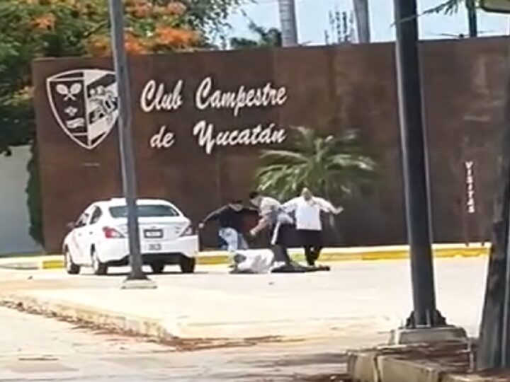 Repartidores de comida le dan una brutal golpiza a un taxista frente el Club Campestre